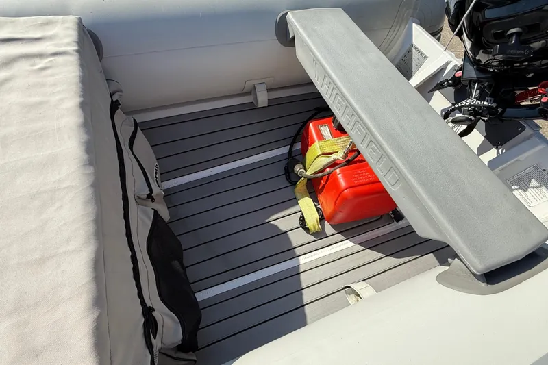 Slide: The Image of Interior of a 2020 Highfield Classic 310 boat with seating and equipment. - 6