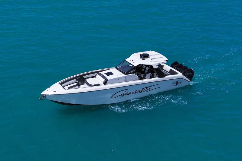 Slide: The Image of 2025 Cigarette 42 Auroris speedboat cruising on clear blue water. - 13