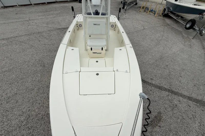 Slide: The Image of 2026 Pathfinder 2300 HPS boat, top view, parked on concrete surface. - 18