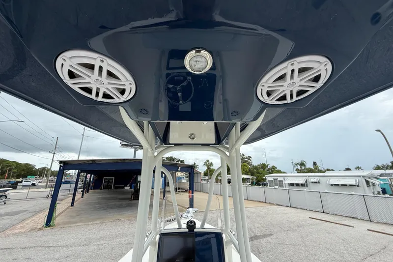 Slide: The Image of 2026 Pathfinder 2300 HPS boat with speakers and light on the T-top. - 33