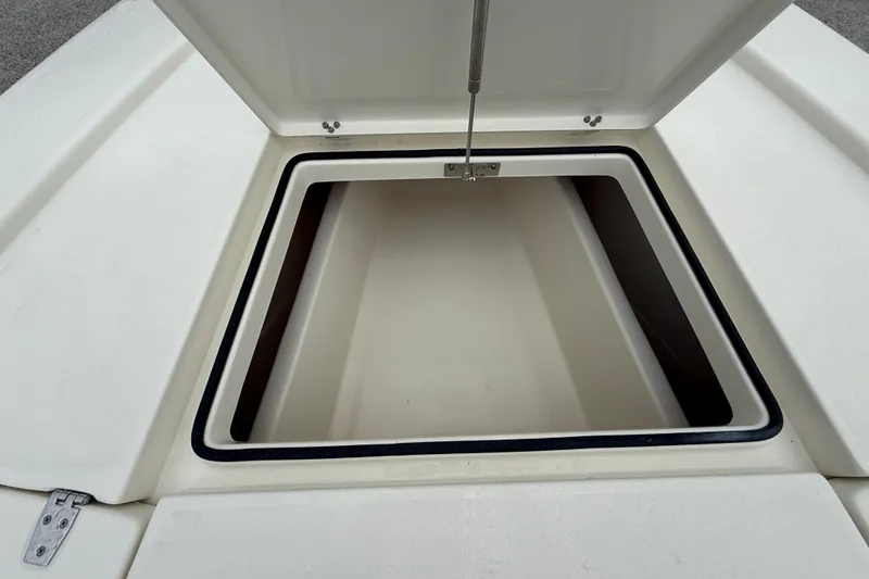 Slide: The Image of Open storage compartment on 2026 Pathfinder 2300 HPS boat, showcasing interior space. - 40