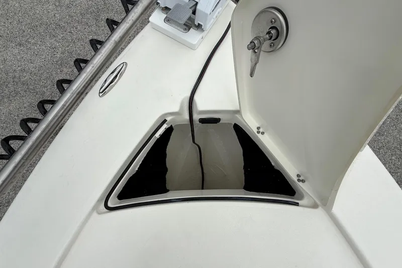 Slide: The Image of Open storage compartment on 2026 Pathfinder 2300 HPS boat deck. - 41