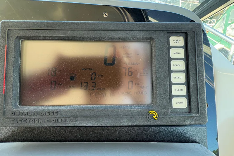 Slide: The Image of Detroit Diesel electronic display on 1996 Tiara 4300 Open boat dashboard. - 14