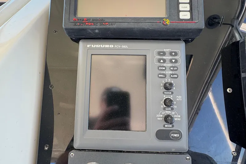 Slide: The Image of Furuno FCV-582L marine display on 1996 Tiara 4300 Open boat dashboard. - 20