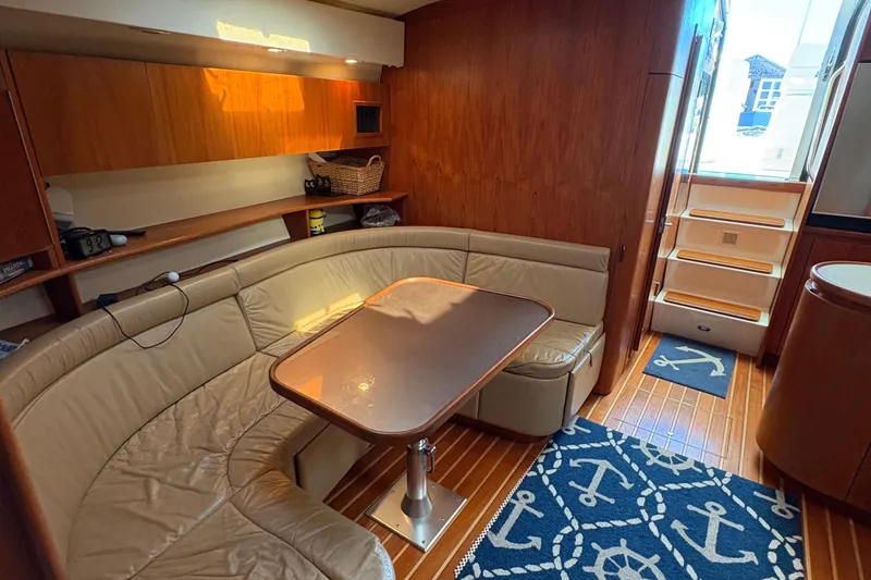 Slide: The Image of Interior of 1996 Tiara 4300 Open yacht with cozy seating and nautical decor. - 22