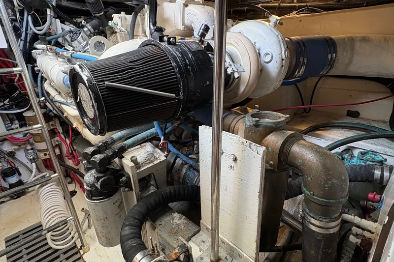 Slide: The Image of Engine room of a 1996 Tiara 4300 Open boat, showcasing mechanical components. - 31