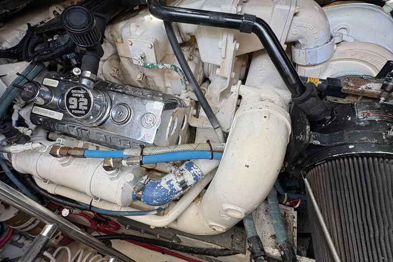 Slide: The Image of Engine compartment of a 1996 Tiara 4300 Open with Detroit Diesel components. - 34