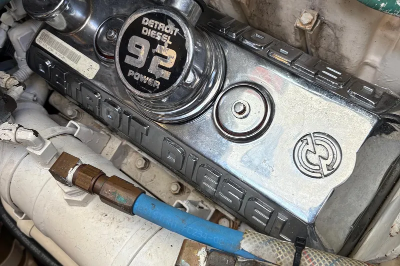 Slide: The Image of Detroit Diesel engine in a 1996 Tiara 4300 Open boat, showcasing chrome details. - 35