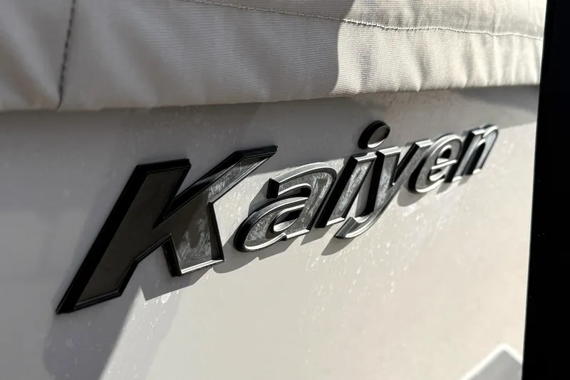 Slide: The Image of 2022 Moomba Kaiyen boat logo in close-up view. - 17