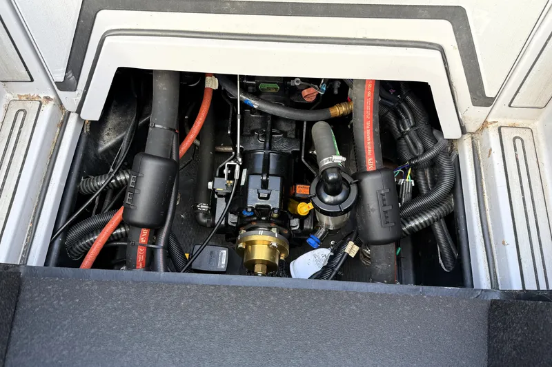 Slide: The Image of 2022 Moomba Kaiyen engine compartment with visible wiring and components. - 20