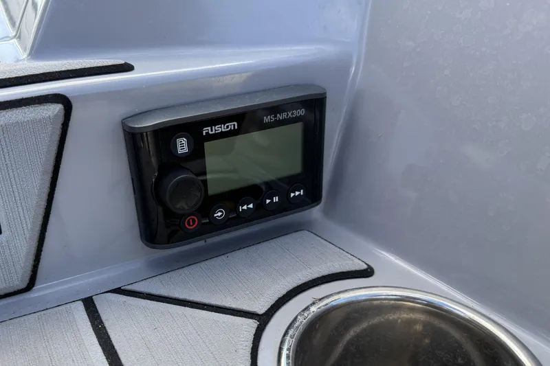 Slide: The Image of Fusion MS-NRX300 stereo system on 2022 Moomba Kaiyen boat dashboard. - 23