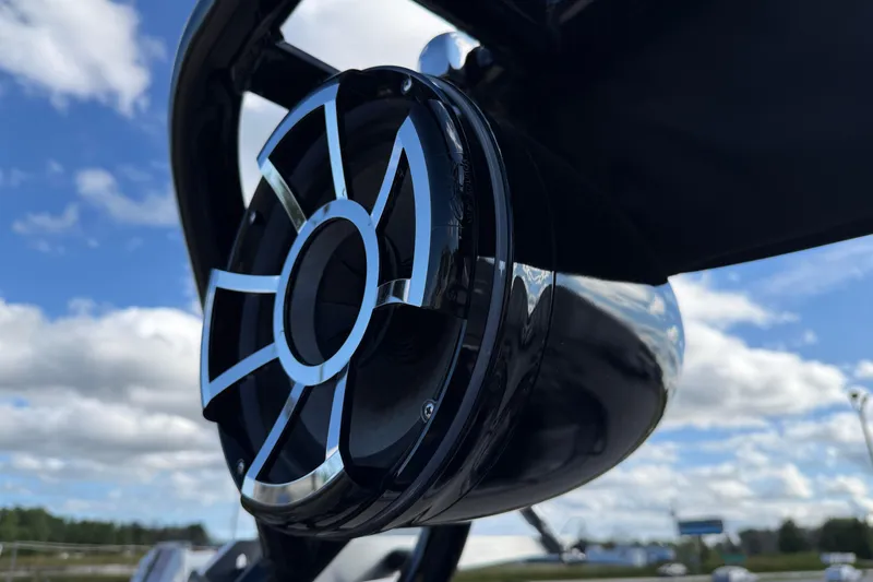 Slide: The Image of Close-up of a 2022 Moomba Kaiyen boat speaker against a cloudy sky. - 26