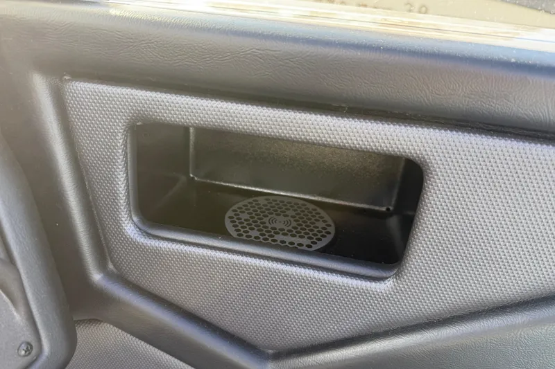 Slide: The Image of 2022 Moomba Kaiyen interior detail with wireless charging pad. - 27