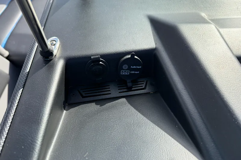 Slide: The Image of 2022 Moomba Kaiyen dashboard with audio and USB input ports. - 29