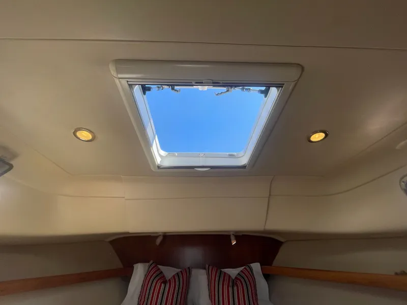 Slide: The Image of Interior cabin view of 2005 Mainship Pilot 30-II with skylight and recessed lighting. - 42