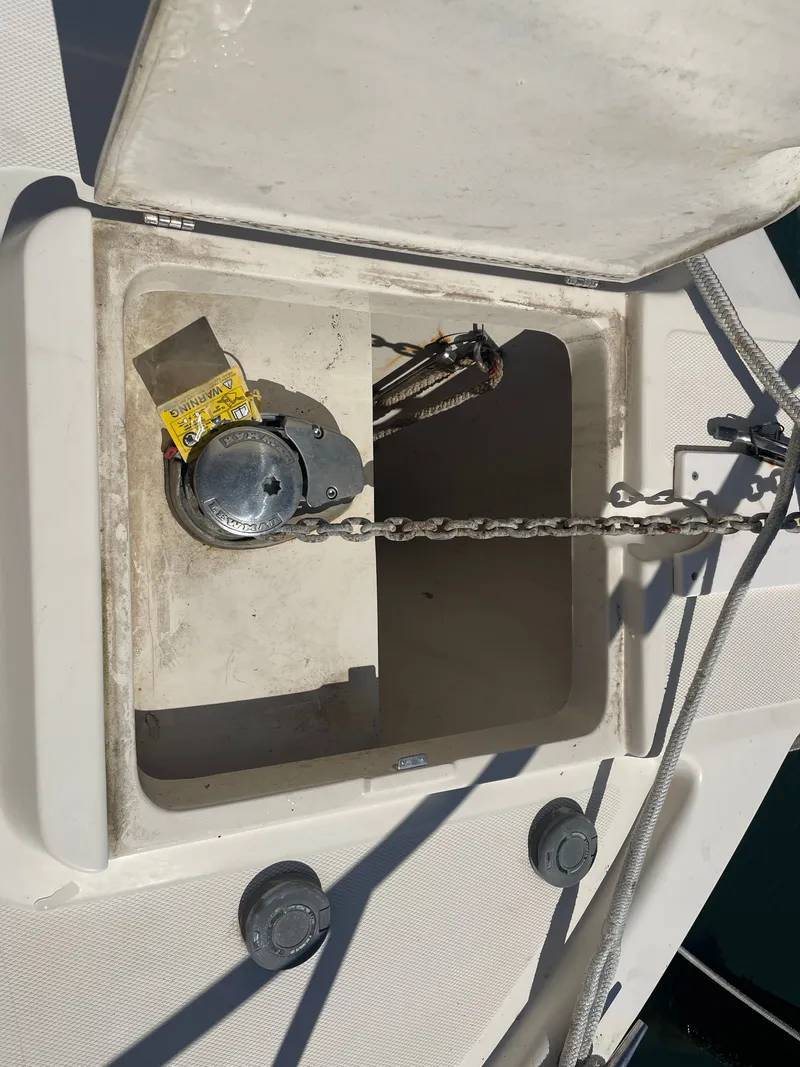 Slide: The Image of Anchor locker of 2005 Mainship Pilot 30-II with chain and winch mechanism. - 5