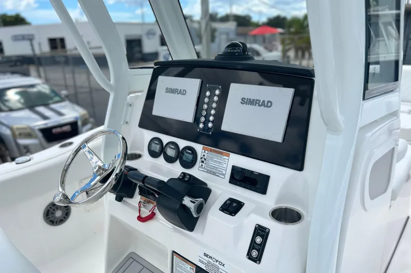Slide: The Image of Helm of 2026 Sea Fox 268 Commander with Simrad electronics and modern controls. - 10