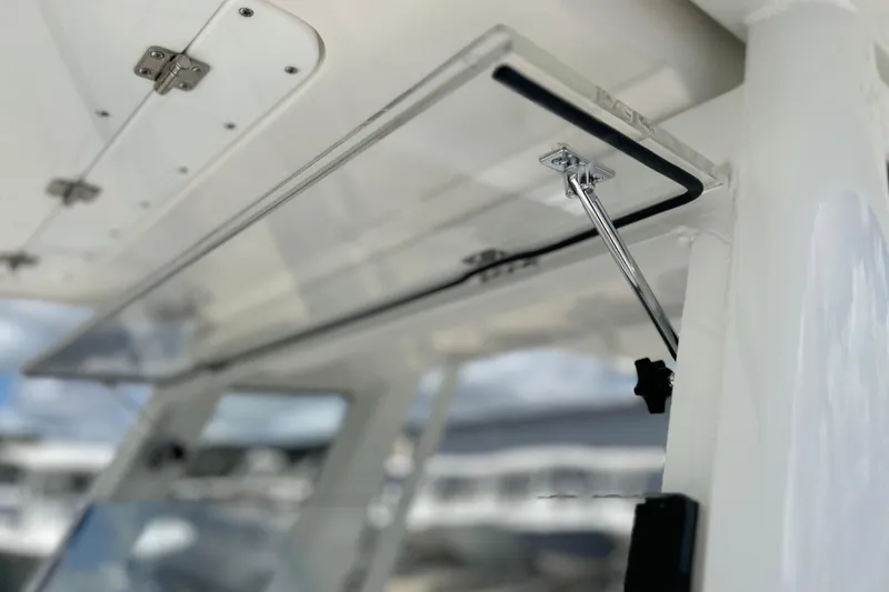 Slide: The Image of 2026 Sea Fox 268 Commander boat hatch detail with hydraulic support. - 14