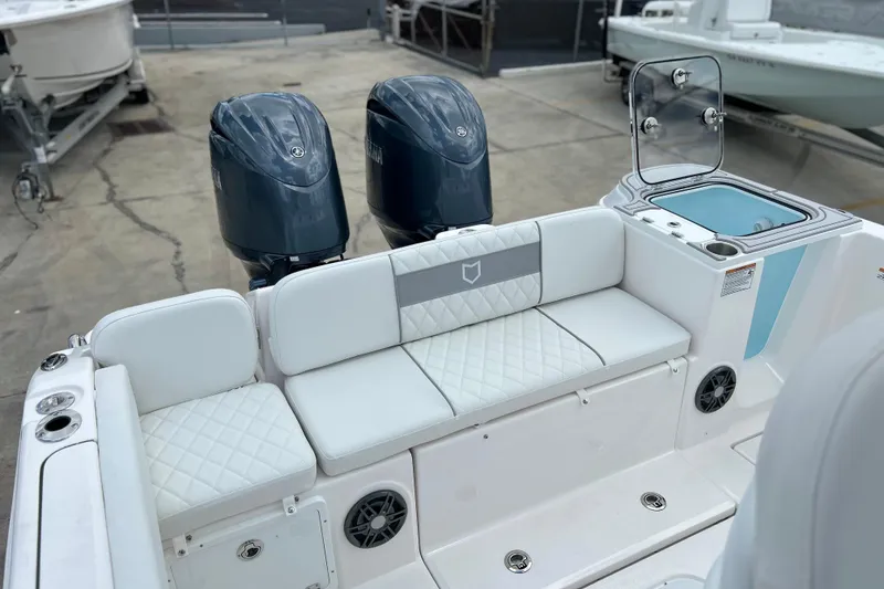 Slide: The Image of 2026 Sea Fox 268 Commander boat with dual engines and cushioned seating. - 15