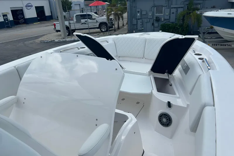 Slide: The Image of 2026 Sea Fox 268 Commander boat interior with open storage compartments and seating. - 27