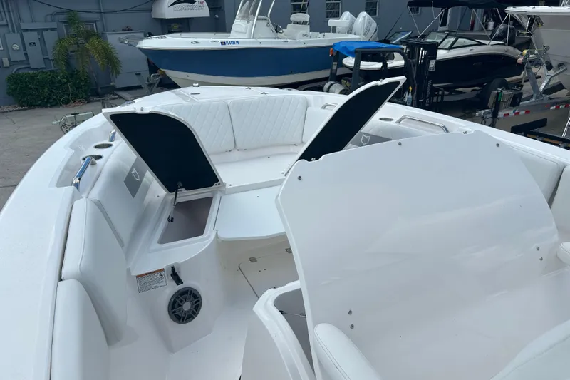 Slide: The Image of 2026 Sea Fox 268 Commander boat interior with open storage compartments and seating. - 28