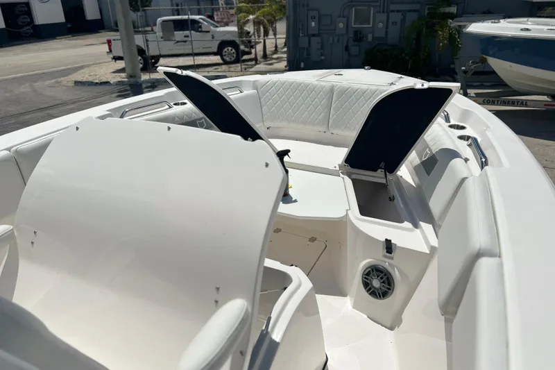 Slide: The Image of 2026 Sea Fox 268 Commander boat interior with open storage compartments and seating. - 31