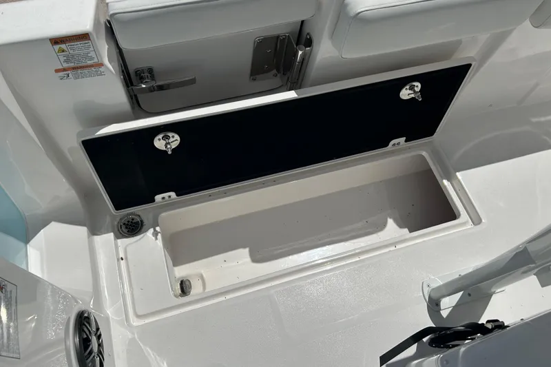 Slide: The Image of 2026 Sea Fox 268 Commander boat storage compartment with open hatch, showcasing interior space. - 34