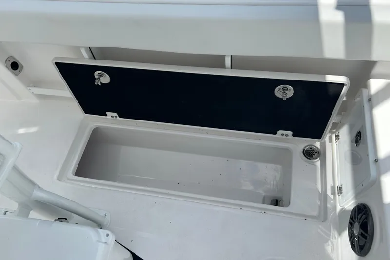 Slide: The Image of Open storage compartment on 2026 Sea Fox 268 Commander boat, showcasing interior space. - 35