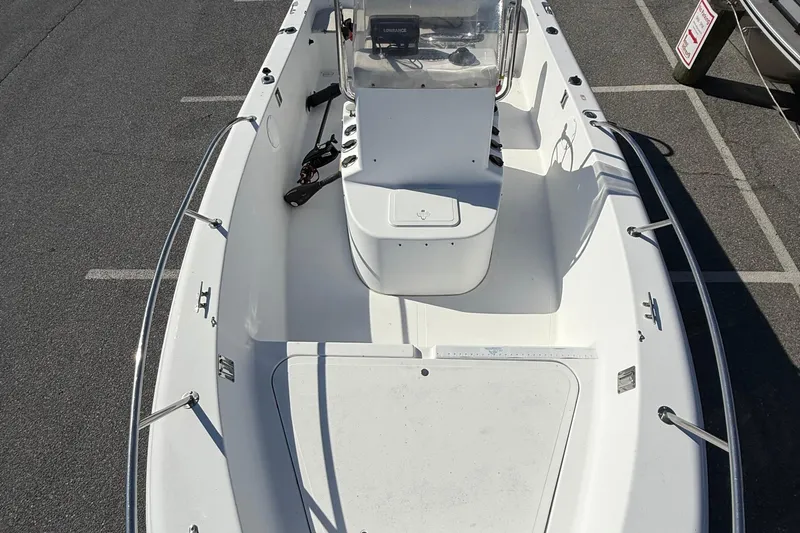 Slide: The Image of 2004 Sea Pro 190 Center Console boat, top view, parked on asphalt. - 14