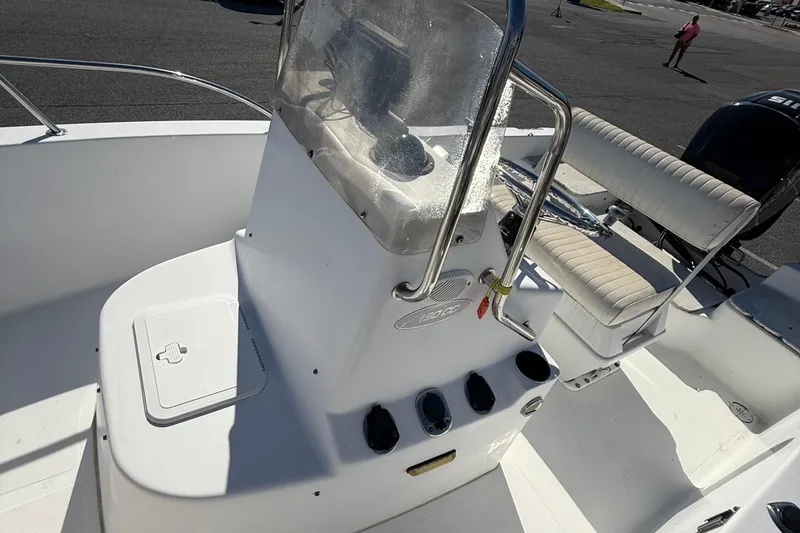 Slide: The Image of 2004 Sea Pro 190 Center Console boat interior with steering console and seating. - 17