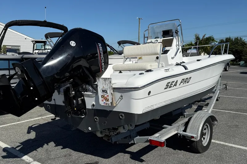 Slide: The Image of 2004 Sea Pro 190 Center Console boat on trailer with Mercury outboard engine. - 8