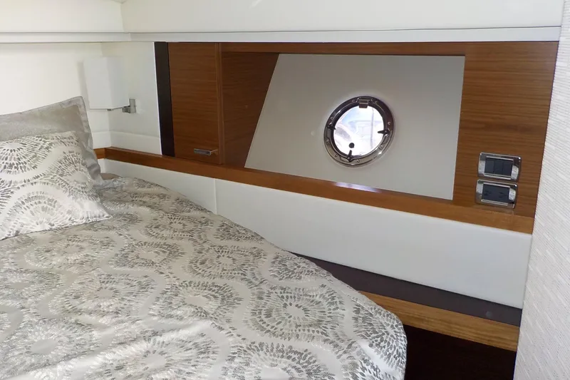 Slide: The Image of Stairway leading to cabin interior of 2018 Tiara Yachts 39 Coupe. - 22