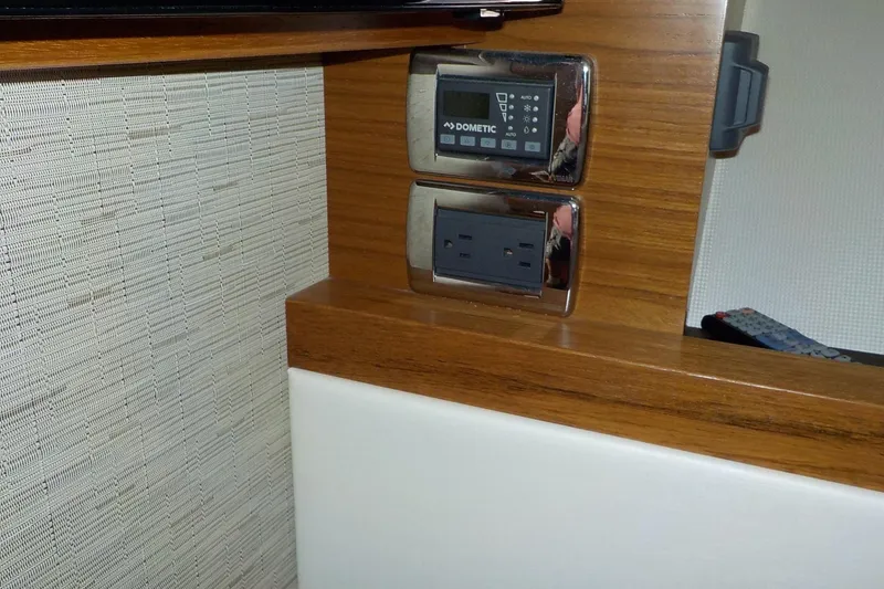 Slide: The Image of Interior cabin of 2018 Tiara Yachts 39 Coupe with porthole and bed. - 24