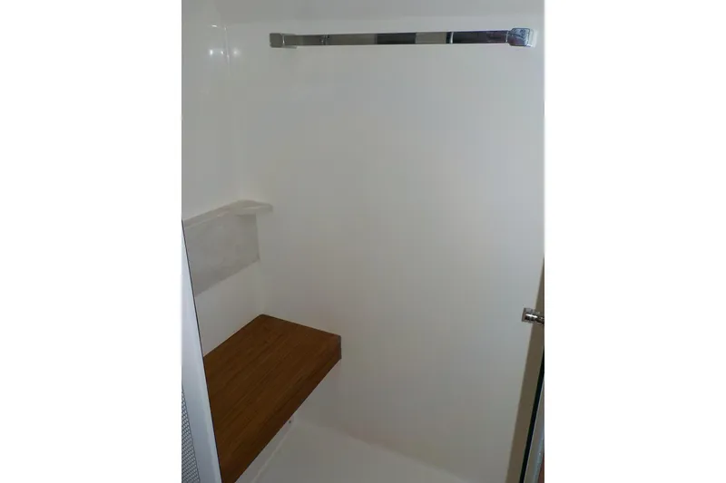 Slide: The Image of Luxurious bed in 2018 Tiara Yachts 39 Coupe cabin with quilted mattress and pillows. - 29