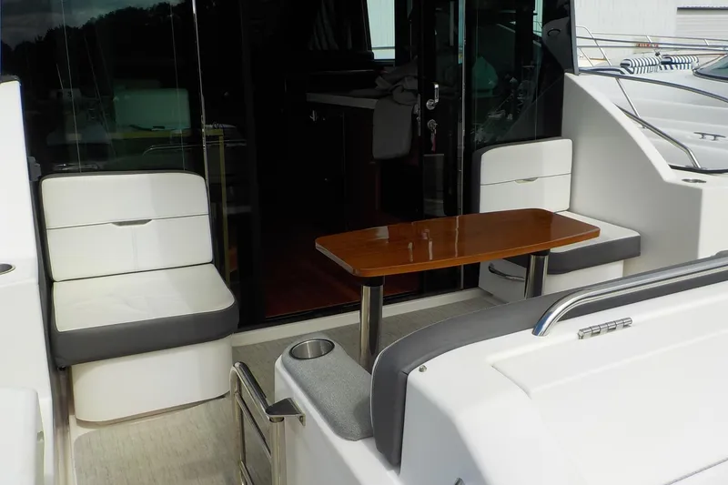 Slide: The Image of Interior wooden closet in 2018 Tiara Yachts 39 Coupe, featuring sleek design and storage space. - 37