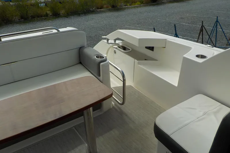 Slide: The Image of Electrical control panel on a 2018 Tiara Yachts 39 Coupe, featuring AC and DC systems. - 38