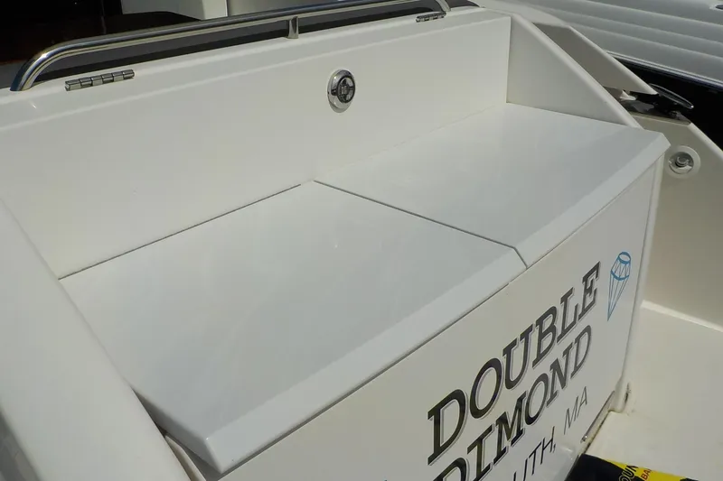 Slide: The Image of 2018 Tiara Yachts 39 Coupe, rear storage compartment labeled "Double Diamond." - 50