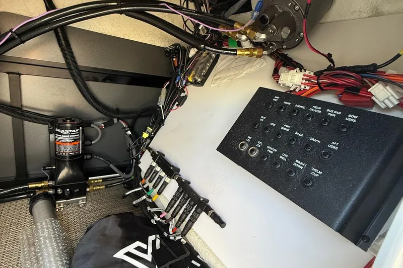 Slide: The Image of Control panel and wiring inside a 2026 Viaggio Lago Z22U boat. - 23