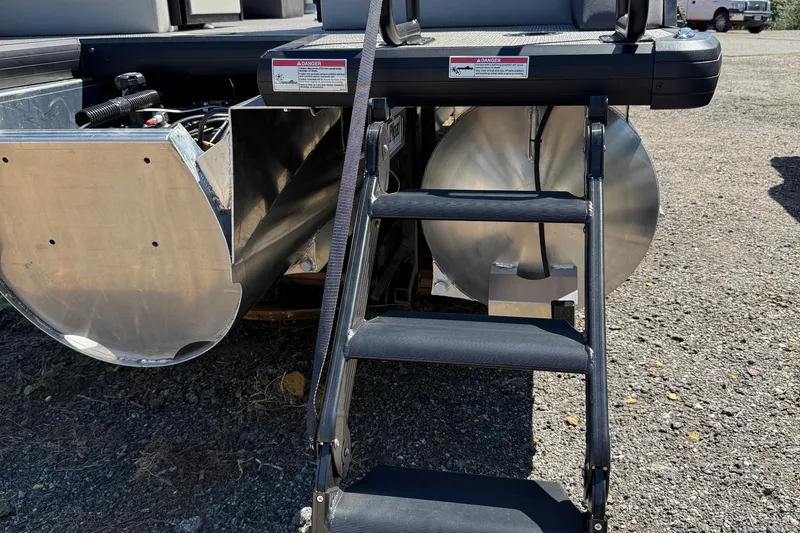 Slide: The Image of Rear view of 2026 Viaggio Lago Z22U pontoon boat with ladder and aluminum pontoons. - 4