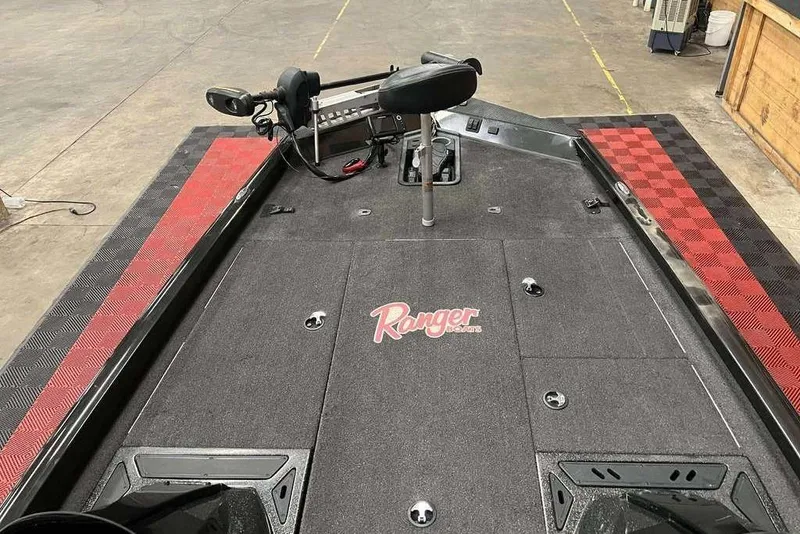 Slide: The Image of 2018 Ranger RT198P boat deck with red accents and fishing seat. - 5