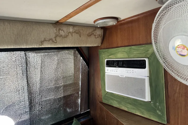 Slide: The Image of Interior of 1986 Carver 42 Aft Cabin Motoryacht with air conditioner and fan. - 29