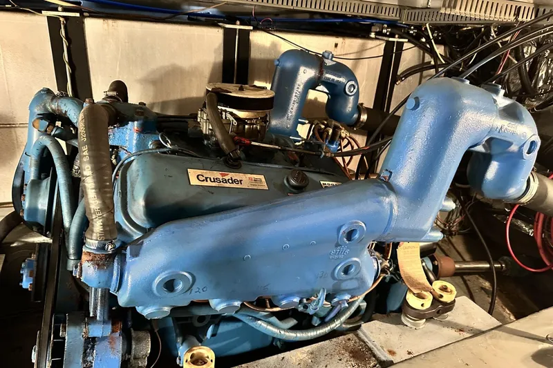 Slide: The Image of Engine of 1986 Carver 42 Aft Cabin Motoryacht, featuring a Crusader motor. - 38