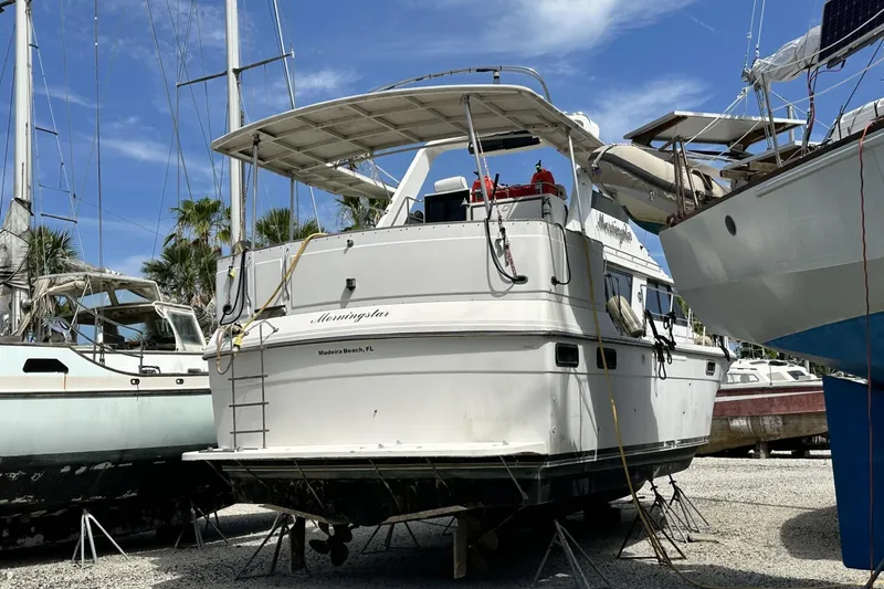 Slide: The Image of 1986 Carver 42 Aft Cabin Motoryacht on dry dock, Madeira Beach, FL. - 5