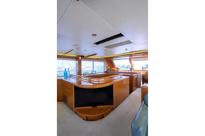 Slide: The Image of Luxurious interior of 1985 Feadship Yacht Fisherman with elegant wood finishes and modern design. - 102