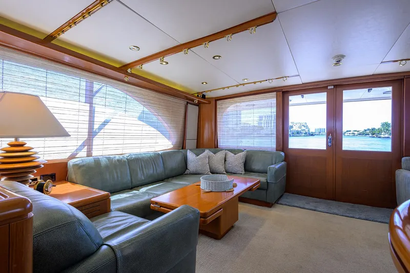 Slide: The Image of Luxurious interior of 1985 Feadship Yacht Fisherman with elegant seating and scenic views. - 111