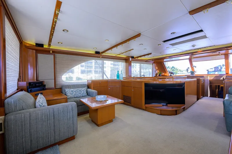 Slide: The Image of Luxurious interior of 1985 Feadship Yacht Fisherman with elegant wood finishes and modern furnishings. - 112