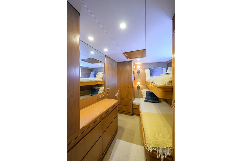 Slide: The Image of Luxurious 1985 Feadship Yacht Fisherman cabin with wooden interiors and cozy bunk beds. - 126