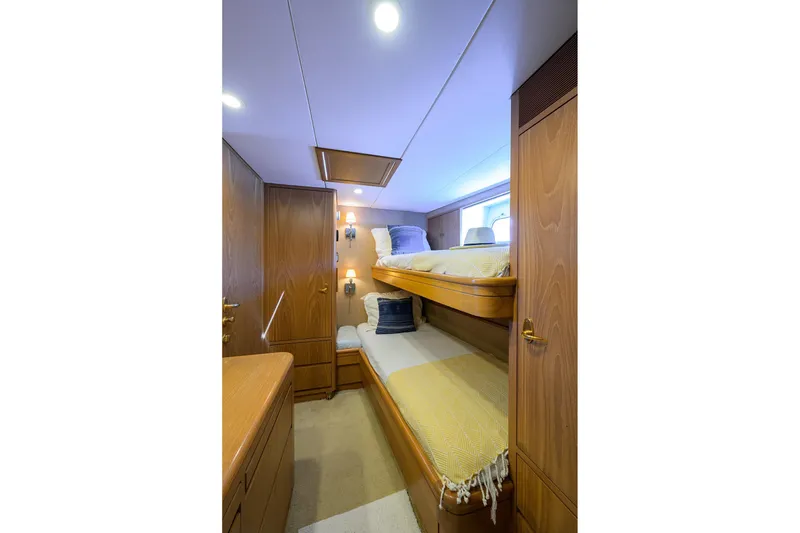 Slide: The Image of Luxurious 1985 Feadship Yacht Fisherman cabin with wooden interior and cozy bunk beds. - 127