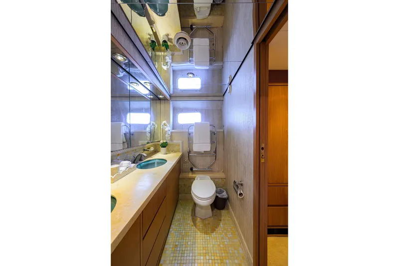 Slide: The Image of Luxurious 1985 Feadship Yacht Fisherman bathroom with modern fixtures and elegant design. - 140