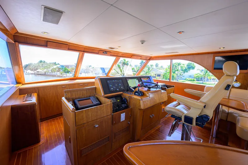 Slide: The Image of Luxurious 1985 Feadship Yacht Fisherman helm with modern navigation equipment and panoramic windows. - 38